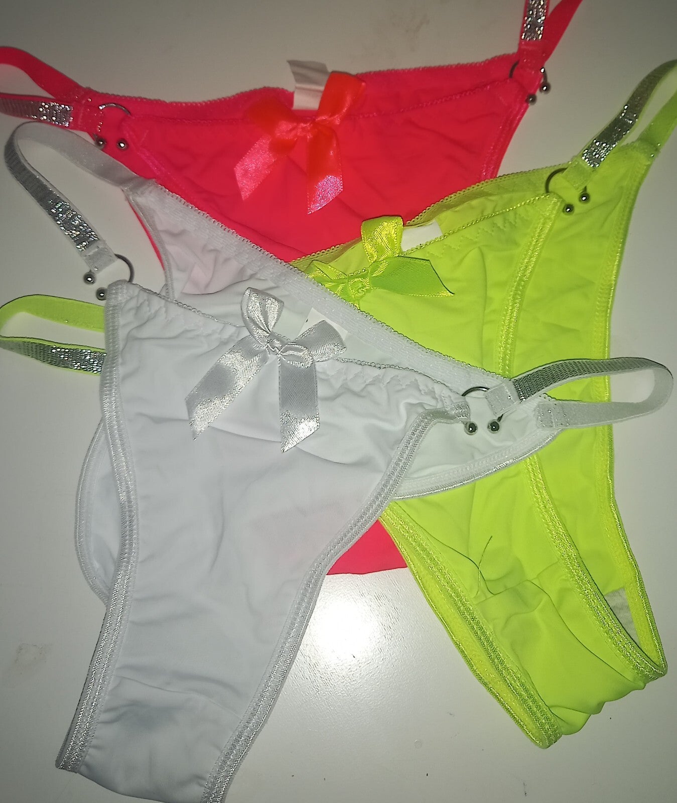 Soft silky feel panties Tanga with bow detail and chain design easy to open